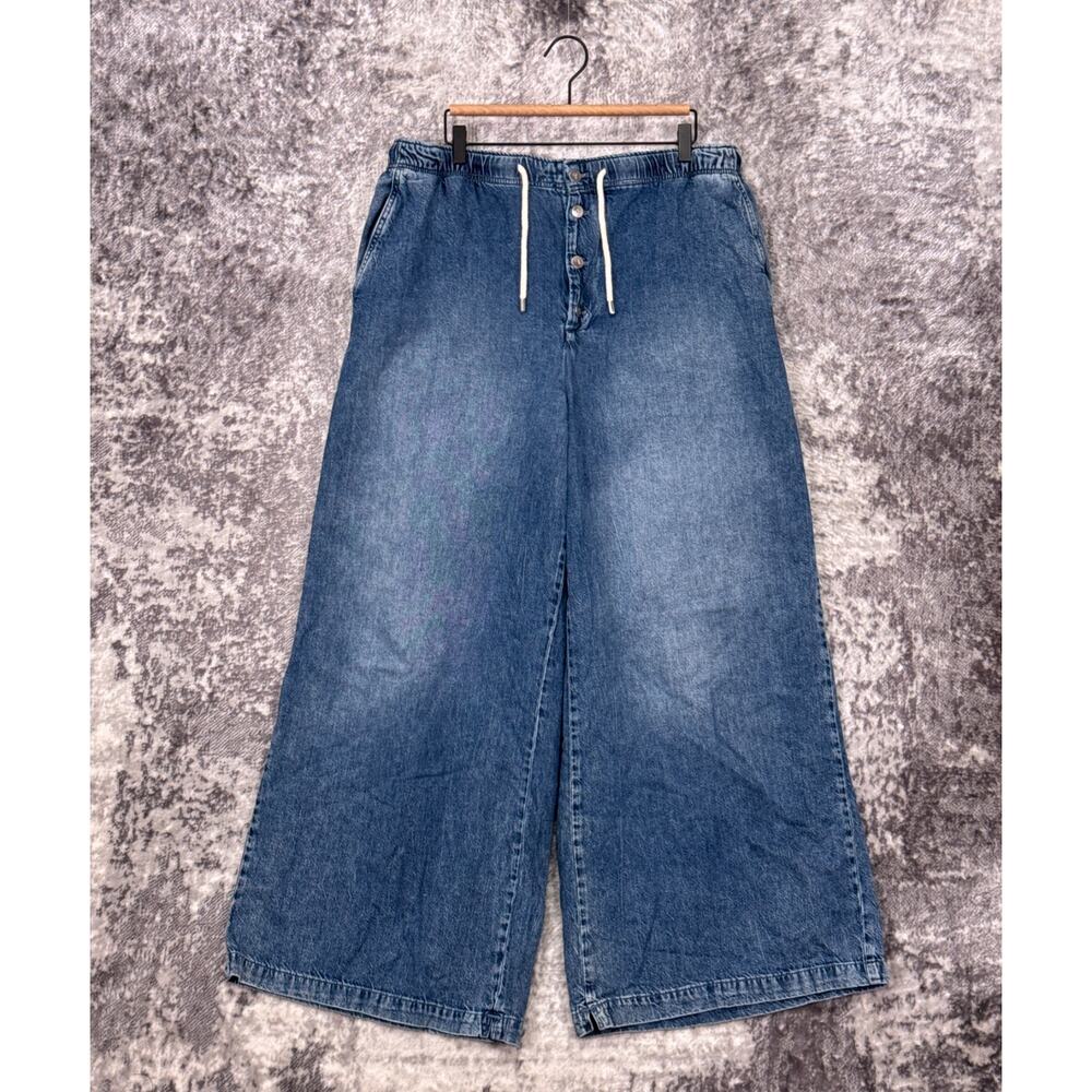 Pilcro Wide Leg Flare Jeans in Medium Wash Blue